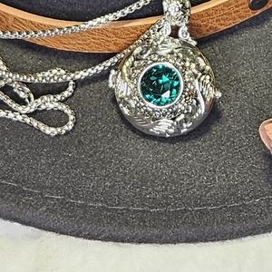 Emerald stone silver locket necklace